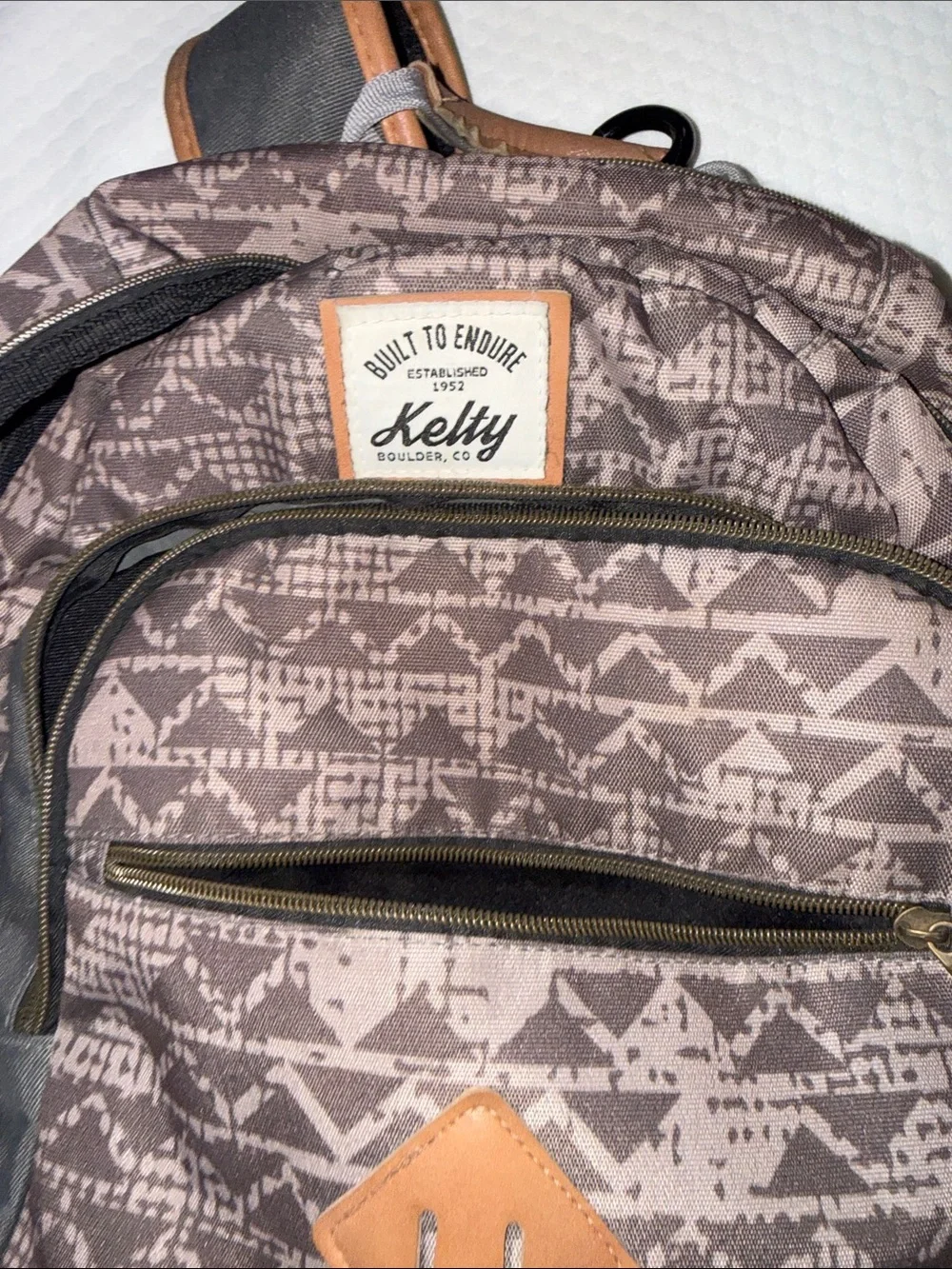 Brown Patterned Men's Backpack with Tan Trim